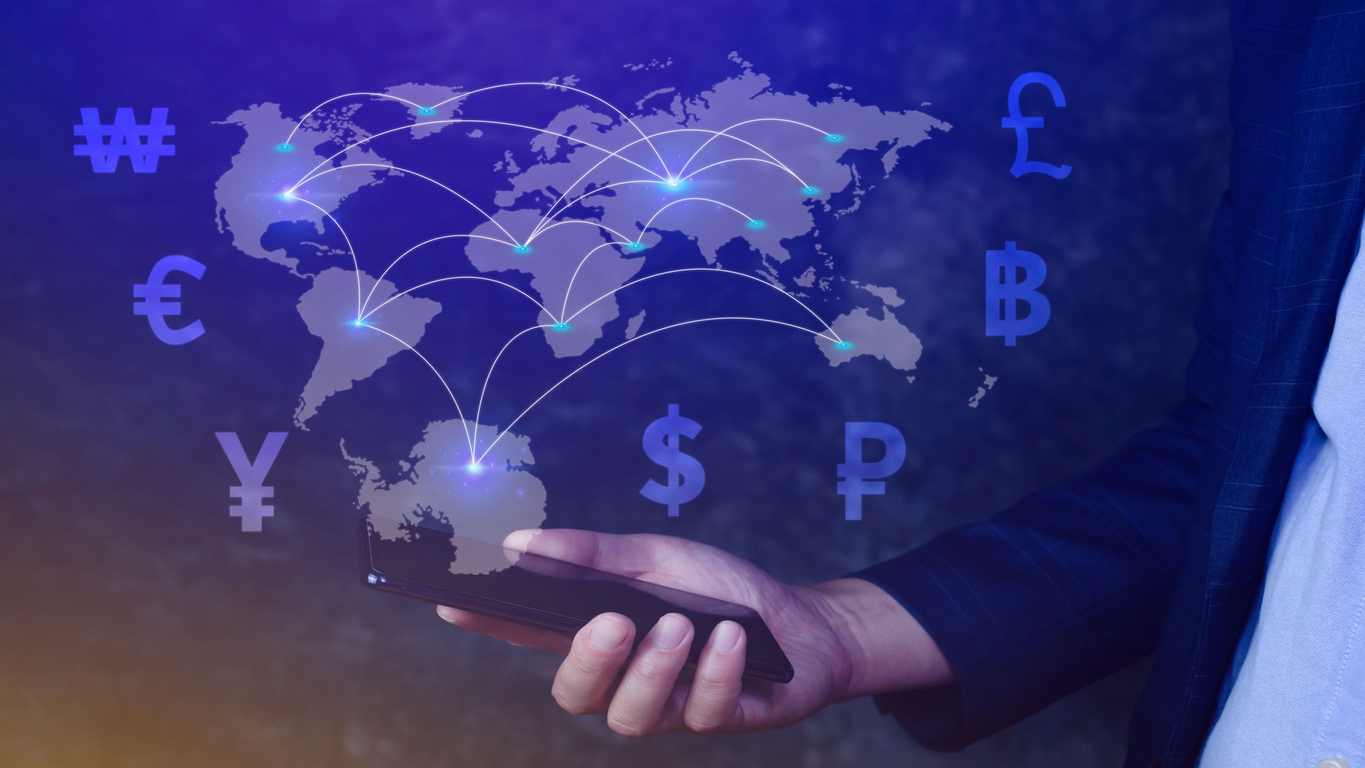 Businessman using mobile phone and laptop computer to money transfers and currency exchanges between countries of the world, online banking interbank payment concept.